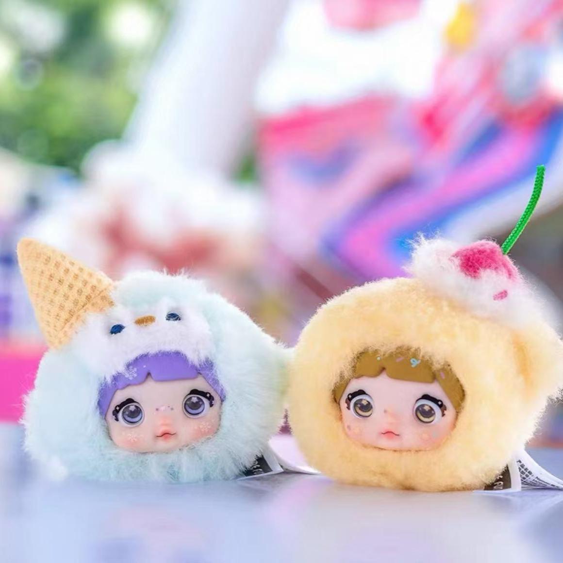 Nommi Plush Blind Box - Sweetness 100%! Ideal for Girls as Birthday Gifts! Each blind box contains an adorably soft plush doll, perfect as a backpack charm or bag pendant. With multiple cute designs in each series