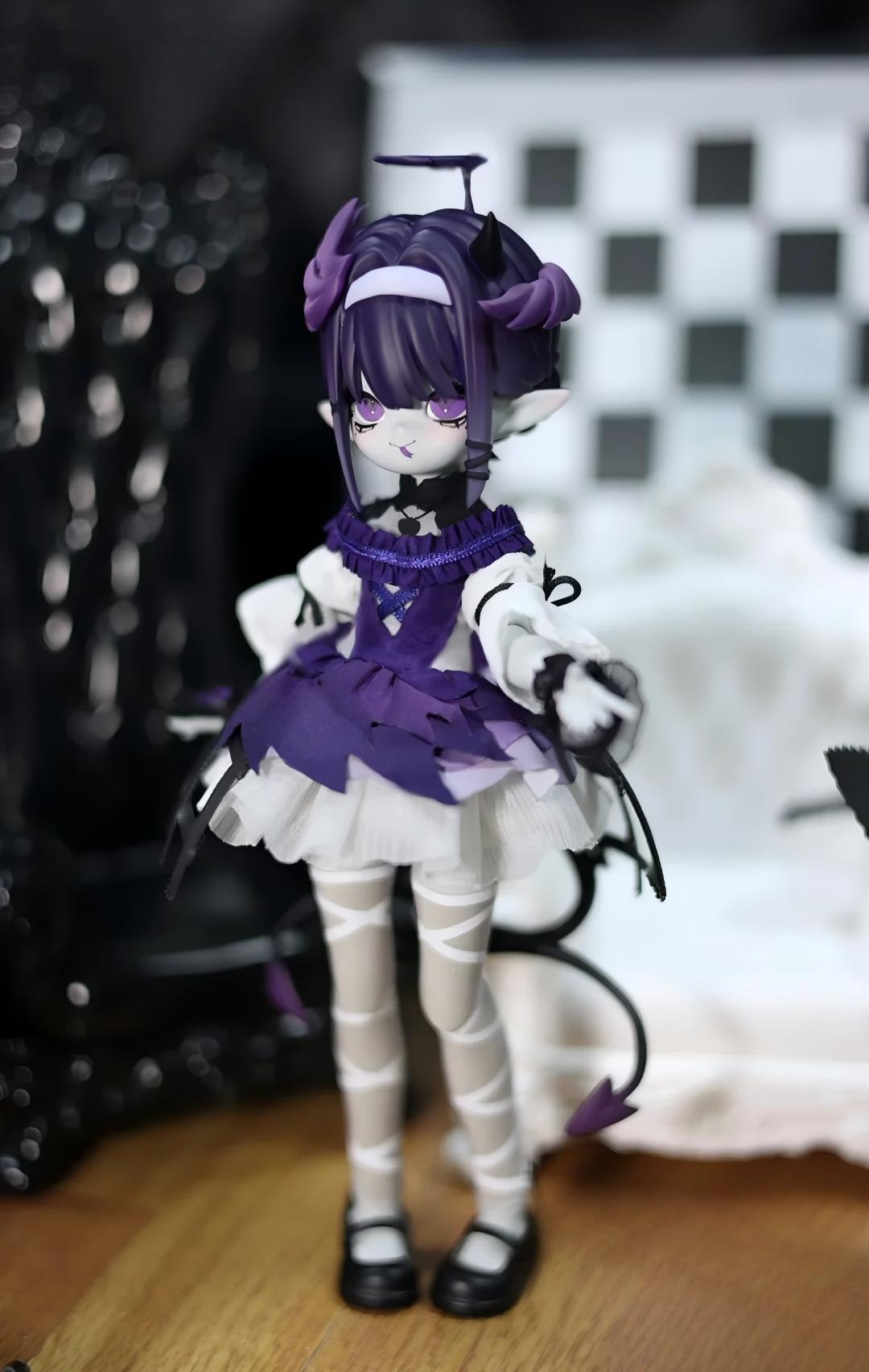 Feifei Devil Card: An articulated figure featuring a dual-sided angel/devil concept—a trendy, fully assembled purple-and-black Gothic little devil collectible.