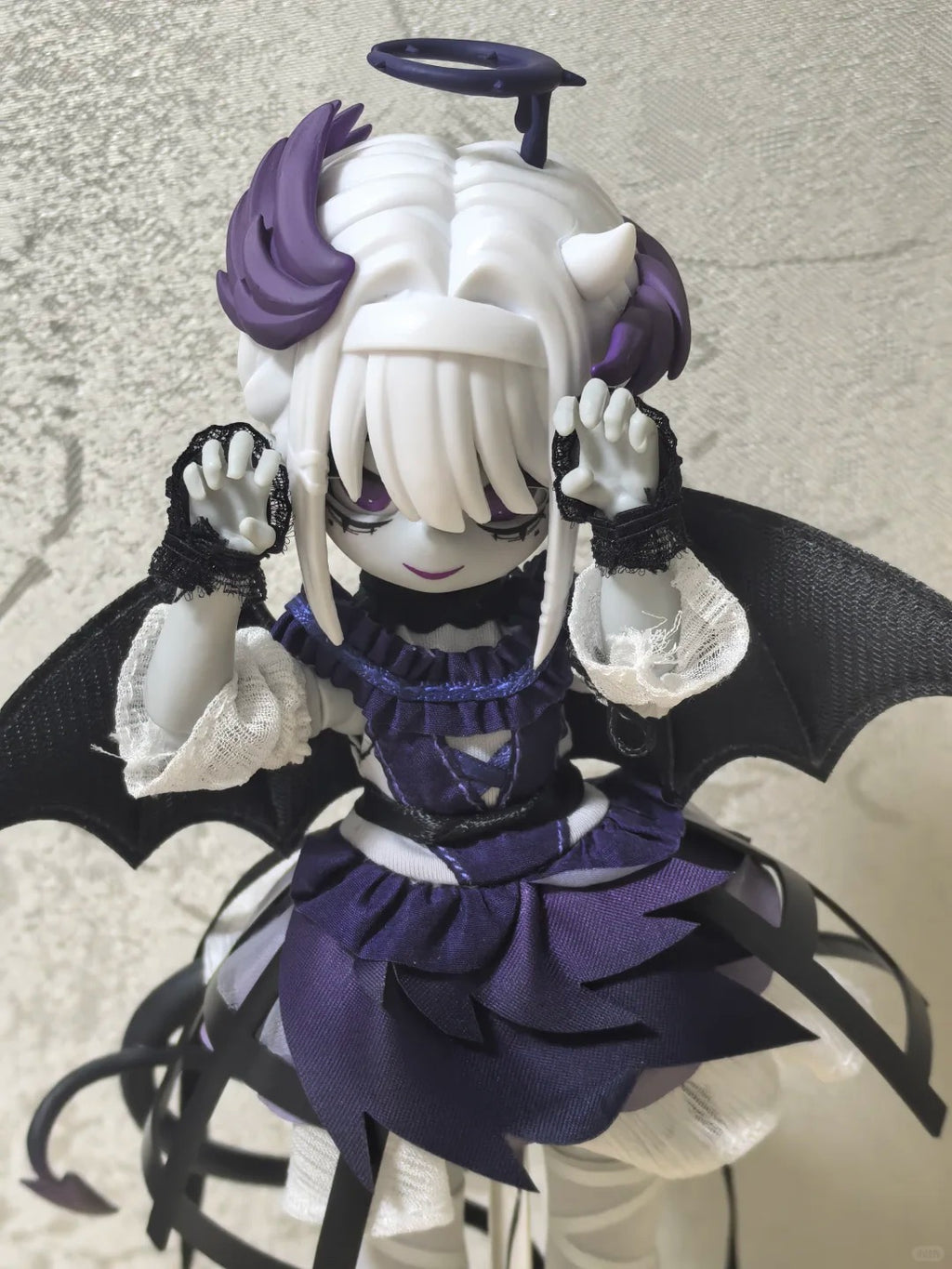 Feifei Devil Card: An articulated figure featuring a dual-sided angel/devil concept—a trendy, fully assembled purple-and-black Gothic little devil collectible.