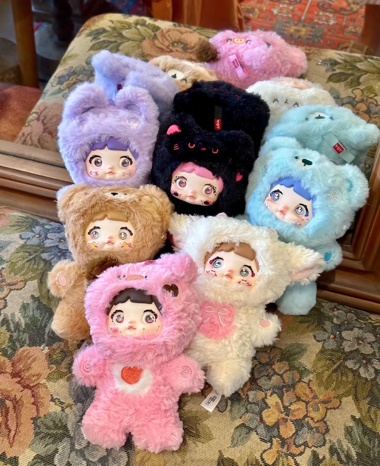 Nommi Loveliness Never Ends Collection Plush Blind Box – Cute Around the Clock Mystery Collectible Stuffed Toy Surprise Gift for Kids and Fans Soft and Adorable Figures Blindbags